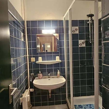 3 115